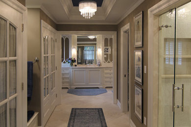 Photo of a traditional ensuite bathroom in Philadelphia with recessed-panel cabinets.