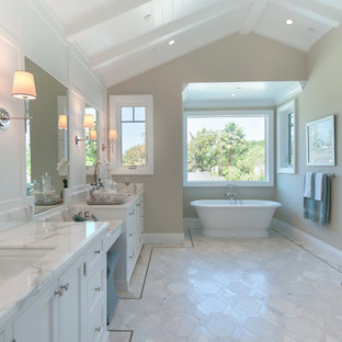 Inspiration for a large timeless master white tile and stone tile marble floor bathroom remodel in Los Angeles with an undermount sink, shaker cabinets, white cabinets, marble countertops, a two-piece toilet and white walls