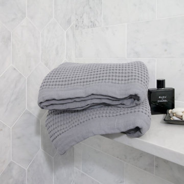 Master Bathroom in Carrara Marble: Floating Shower Bench