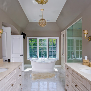 Master Bathroom in Carrara Marble with Free Standing Tub, Separate Vanities
