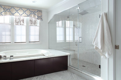 Bathroom - large transitional master white tile and marble tile marble floor, white floor and double-sink bathroom idea in New York with flat-panel cabinets, dark wood cabinets, an undermount tub, a one-piece toilet, gray walls, an undermount sink, marble countertops, a hinged shower door, white countertops and a built-in vanity