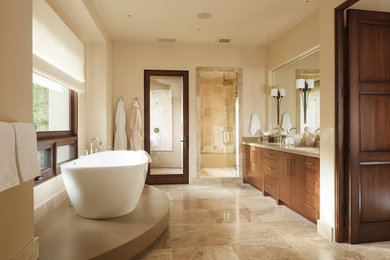 Large trendy master stone tile travertine floor freestanding bathtub photo in San Francisco with flat-panel cabinets, medium tone wood cabinets and an undermount sink