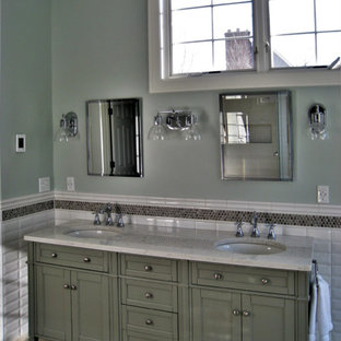 Large transitional master white tile and subway tile porcelain tile bathroom photo with shaker cabinets, gray cabinets, a one-piece toilet, blue walls, an undermount sink and quartz countertops