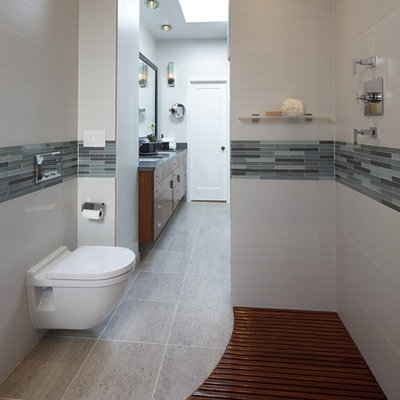 Inspiration for a contemporary walk-in shower remodel in Dallas with a wall-mount toilet