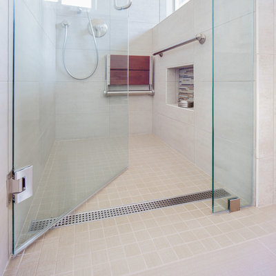 Example of a mid-sized transitional 3/4 multicolored tile and glass tile porcelain tile walk-in shower design in San Diego with an undermount sink, raised-panel cabinets, medium tone wood cabinets, quartz countertops, a two-piece toilet and beige walls