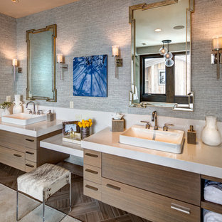 Design ideas for a large country master bathroom in Salt Lake City with flat-panel cabinets, medium wood cabinets, grey walls, ceramic floors, granite benchtops, brown floor, a vessel sink and grey benchtops.