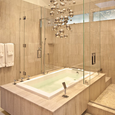 Inspiration for a mid-sized contemporary master beige tile and porcelain tile beige floor bathroom remodel in Los Angeles with beige walls and a hinged shower door