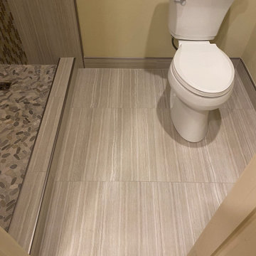 MASTER BATHROOM - Tub-To-Shower 12" x 24" Gray Porcelain Tile Vertically Aligned