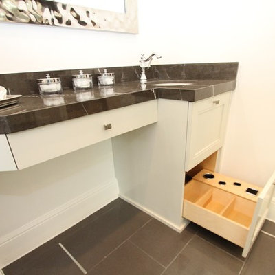 Bathroom - small transitional master black tile and porcelain tile porcelain tile bathroom idea in Austin with an undermount sink, flat-panel cabinets, white cabinets, marble countertops and white walls