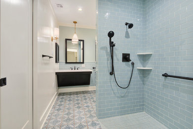 Inspiration for a mid-sized modern master white tile and subway tile porcelain tile and multicolored floor bathroom remodel in New Orleans with shaker cabinets, dark wood cabinets, a two-piece toilet, white walls, an undermount sink and quartzite countertops