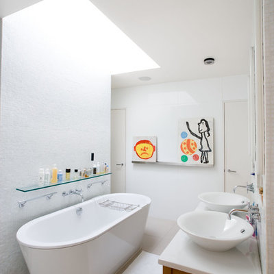 Inspiration for a contemporary kids' freestanding bathtub remodel in New York with a vessel sink