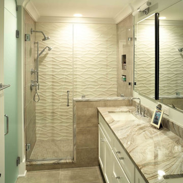 Master bathroom with double sinks and textured shower
