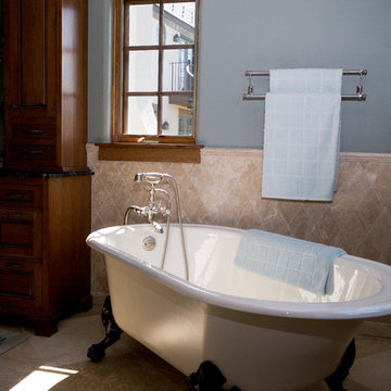 Master Bathroom with Free-Standing Claw Foot Tub and Limestone Tile