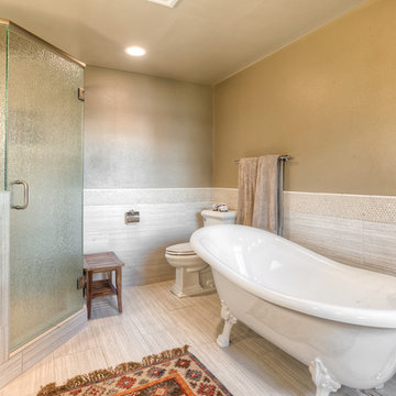 Master Bathroom with High End Finishes and Featuring a Corner Shower with His