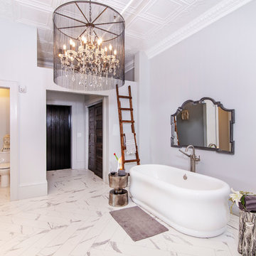 Master bathroom with large chandelier