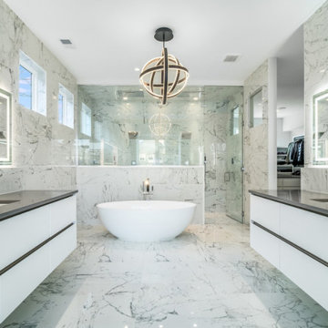 Master bathroom with open walk in closet