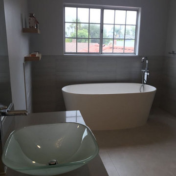 Master Bathroom with Separate Sink And Bathtub