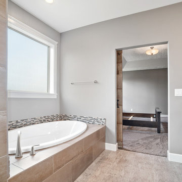 Master Bathroom With Tile Tub Surround