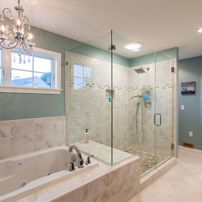 Mid-sized elegant master ceramic tile and beige tile ceramic tile and beige floor bathroom photo in Philadelphia with green walls, raised-panel cabinets, dark wood cabinets, an undermount sink and a hinged shower door