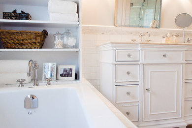 Bathroom - mid-sized traditional master white tile and subway tile porcelain tile bathroom idea in Ottawa with a drop-in sink, raised-panel cabinets, white cabinets, marble countertops, a one-piece toilet and gray walls