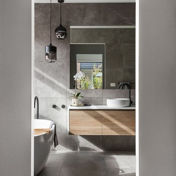 Master ensuite - wall hung vanity & freestanding bathtub