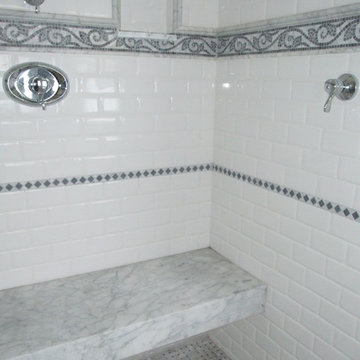 Master Shower with built in marble bench.