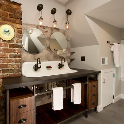 Inspiration for a large industrial master gray tile and porcelain tile porcelain tile bathroom remodel in DC Metro with a trough sink, open cabinets, dark wood cabinets, quartz countertops and gray walls