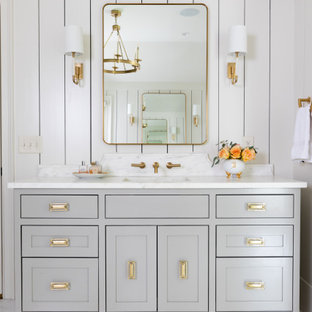 Transitional white floor, single-sink and shiplap wall bathroom photo in Atlanta with shaker cabinets, gray cabinets, white walls, an undermount sink, white countertops and a built-in vanity