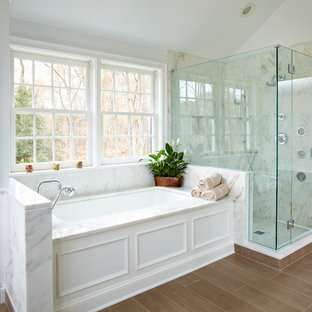 Alcove shower - traditional alcove shower idea in New York with an undermount tub