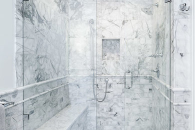 Mid-sized elegant master gray tile and marble tile marble floor and gray floor alcove shower photo in Detroit with furniture-like cabinets, white cabinets, a one-piece toilet, gray walls, an undermount sink, quartz countertops, a hinged shower door and gray countertops