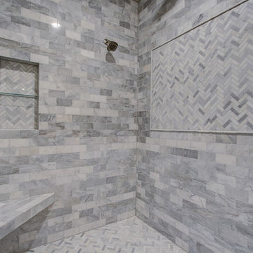 Master Walk In Shower with Marble Tiles