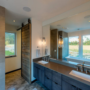Photo of a large country master bathroom in Seattle with flat-panel cabinets, brown cabinets, an alcove shower, white tile, porcelain tile, white walls, concrete floors, an undermount sink, recycled glass benchtops, beige floor, an open shower and grey benchtops.