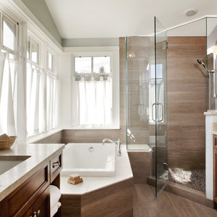 Transitional corner shower photo in Denver with an undermount sink