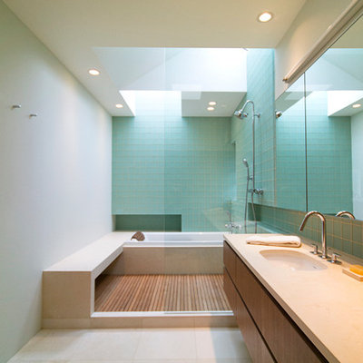 Bathroom - large contemporary master blue tile and glass tile porcelain tile and beige floor bathroom idea in Seattle with an undermount sink, flat-panel cabinets, dark wood cabinets and gray walls