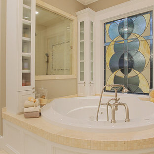 Design ideas for a classic bathroom in Houston with a corner shower, beige tiles, mosaic tiles and a hot tub.