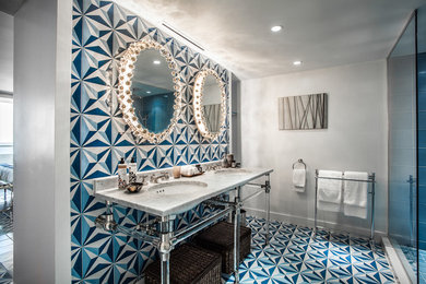 Inspiration for a coastal multicolored tile alcove shower remodel in Miami with an undermount sink and white walls
