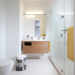 Alcove shower - modern kids' white tile alcove shower idea in Miami with flat-panel cabinets and medium tone wood cabinets