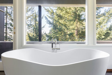 Example of a huge 1950s master porcelain tile and gray floor bathroom design in Portland with flat-panel cabinets, dark wood cabinets, white walls, an undermount sink, quartz countertops and a hinged shower door