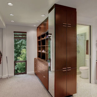 Example of a mid-century modern green tile and glass tile bathroom design in Seattle with a vessel sink, flat-panel cabinets, dark wood cabinets, glass countertops and white walls