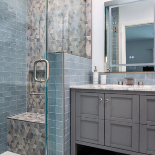 Inspiration for a small 1960s kids' blue tile and ceramic tile marble floor, white floor and single-sink alcove shower remodel in Los Angeles with shaker cabinets, gray cabinets, a two-piece toilet, white walls, an undermount sink, marble countertops, a hinged shower door, white countertops, a niche and a freestanding vanity