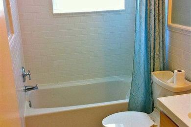This is an example of a small midcentury family bathroom in Orlando with freestanding cabinets and light wood cabinets.