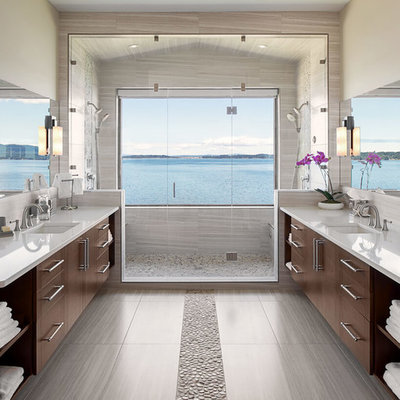 Example of a trendy master pebble tile floor double shower design in Vancouver with flat-panel cabinets, dark wood cabinets, beige walls and an undermount sink