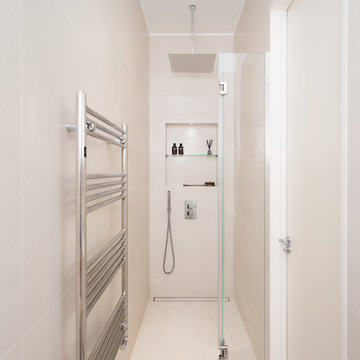 Minimalist shower solution for a tiny bathroom at our Netherhall Gardens Project
