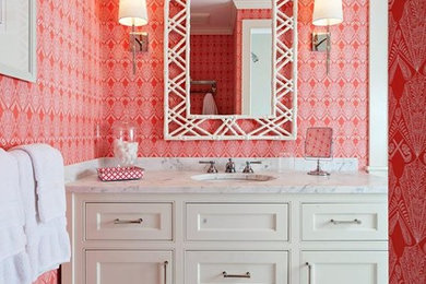 Mid-sized 3/4 mosaic tile floor bathroom photo in Boston with a drop-in sink, white cabinets, marble countertops and red walls