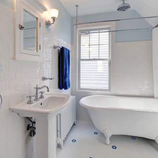 Inspiration for a small craftsman white tile and subway tile mosaic tile floor bathroom remodel in Other with a pedestal sink, a two-piece toilet and blue walls