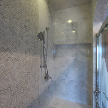 Mix of Marble Tile Sizes used in Walk In Shower