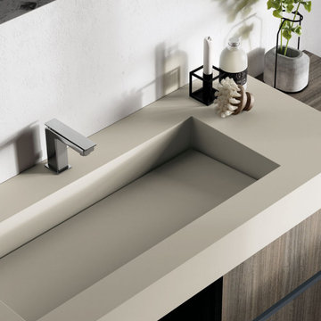 Modern asymmetrical bathroom vanity with beige countertop