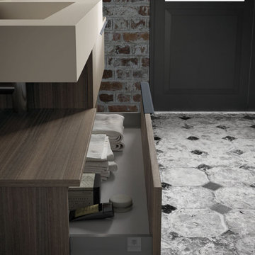 Modern asymmetrical bathroom vanity with beige countertop