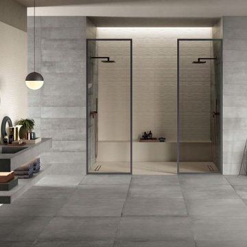 Modern bathroom and shower with stone look porcelain tile walls and floors
