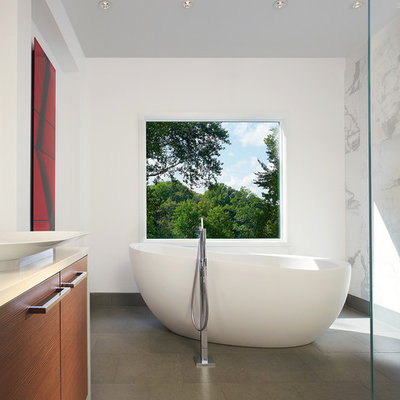 Inspiration for a modern freestanding bathtub remodel in DC Metro with a vessel sink